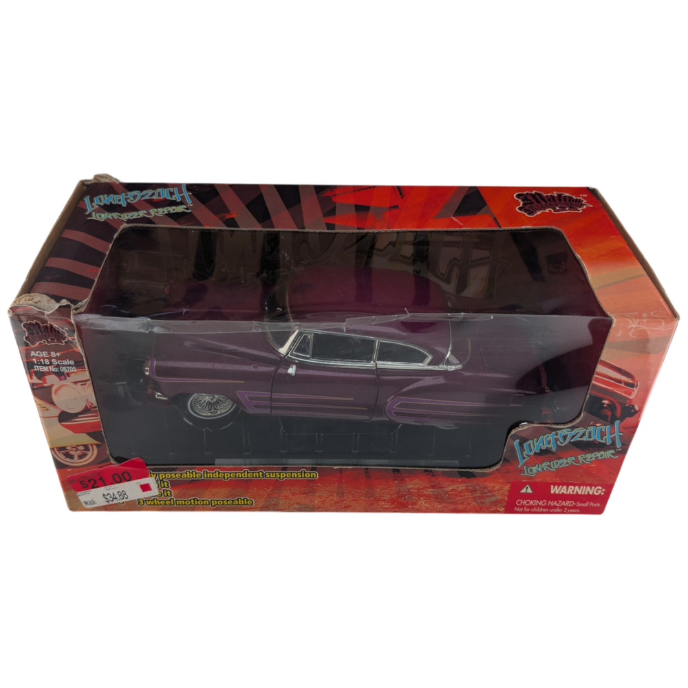 Malibu International Long Beach Lowrider Repair 1954 Chevy Bel Air 1:18 Purple